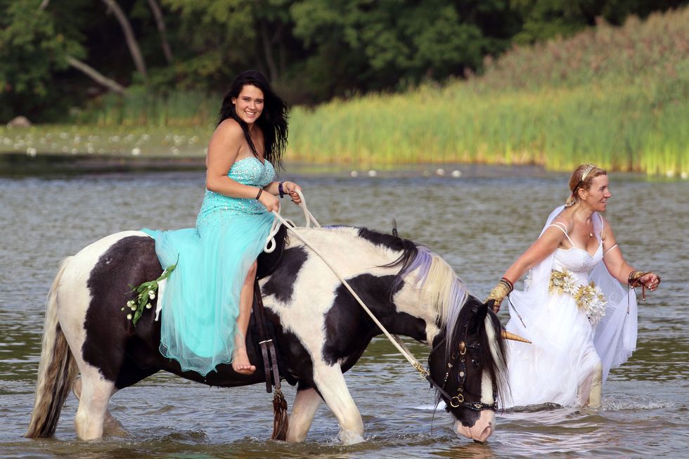 Clothing, Hair, Human, Dress, Water, Horse, Happy, People in nature, Bank, Working animal, 