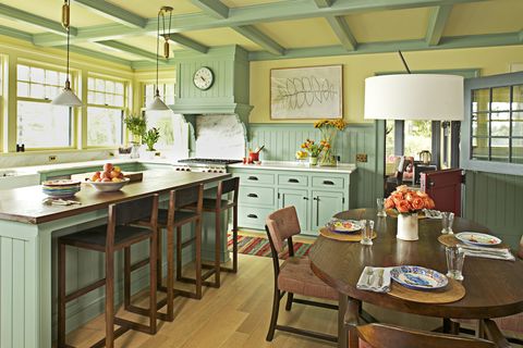 <p>Okay. Deep breaths. We know the thought of a kitchen this bright and two-toned might be terrifying, but in actuality, it can create a wonderfully welcoming atmosphere. "Painting the paneling green cheers up the room, while the soft, buttery yellow of the walls and window trim mellows out the acidity of the color," explains Hendricks.</p><p><br>
</p><p><strong data-redactor-tag="strong">Scrimp On a Kitchen Rug</strong><br>It's going to take a beating anyway. "Besides, it's fun to swap out the rug every now and then, like you would throw pillows on a couch," notes Hendricks. We love indoor-outdoor runners from Dash and Albert (Safavieh handwoven rug, $154 for 8' x 10'; <a href="https://www.overstock.com/" target="_blank" data-tracking-id="recirc-text-link">overstock.com</a>; Phoenix Wool Dhurrie rug, from $59; <a href="http://www.westelm.com/products/phoenix-dhurrie-regal-blue-t1068/" target="_blank" data-tracking-id="recirc-text-link">westelm.com</a>), or look for inexpensive dhurrie or kilim options on Etsy and eBay.
</p><p><br>
</p><p><strong data-redactor-tag="strong">Keep the Art Simple<br></strong>A minimalist drawing won't overpower architectural details. (Drawing by Emma Lawrenson, $103; <a href="https://www.etsy.com/listing/272823956/original-drawing-screenprint-of-a-simple?ref=shop_home_active_33" target="_blank" data-tracking-id="recirc-text-link">littleprintpress.etsy.com</a>; Gallery Solutions frame,  $34.99 for 11" x 14"; <a href="http://www.target.com/p/gallery-solutions-single-image-frame-black/-/A-50069017" target="_blank" data-tracking-id="recirc-text-link">target.com</a>)
</p><p><br>
</p><p><strong data-redactor-tag="strong">Combine Comfort and Style<br></strong>When guests congregate in the kitchen, the seating oughta be comfy. (Sophia Barstool, $299 for 2; <a href="http://www.worldmarket.com/product/espresso-sophia-bonded-leather-barstools-set-of-2.do" target="_blank" data-tracking-id="recirc-text-link">worldmarket.com</a>)
</p>