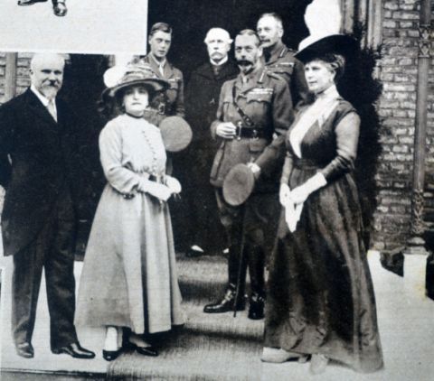 <p>King George V, Queen Mary, and the Prince of Wales are seen out in front of the British Officers' club.&nbsp;<span class="redactor-invisible-space" data-verified="redactor" data-redactor-tag="span" data-redactor-class="redactor-invisible-space"></span></p>