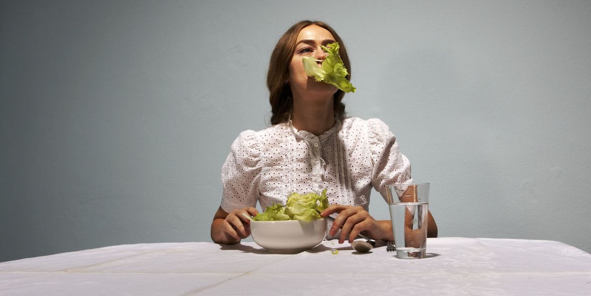 woman eating lettuce