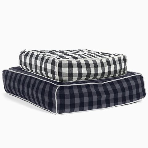 <p>We know you love your dog more than most people, which is why they should have one of the best seats in the house. (Starting at $128; <a href="https://waggo.com/products/buffalo-plaid-square-designer-dog-bed?variant=7994179521" target="_blank"><u data-redactor-tag="u" data-tracking-id="recirc-text-link">waggo.com</u></a>)</p>