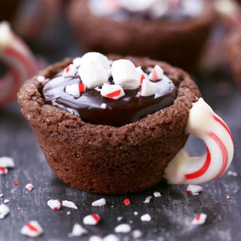 Hot Chocolate Peppermint Cookie Cups <p>These adorable ganache-filled sugar cookies topped with peppermint will be the star of your party's dessert table. </p> <p><strong data-redactor-tag="strong" data-verified="redactor">Get the recipe at <a href="http://www.thegunnysack.com/peppermint-hot-chocolate-cookie-cups/" target="_blank" data-tracking-id="recirc-text-link">The Gunny Sack</a>. </strong></p>