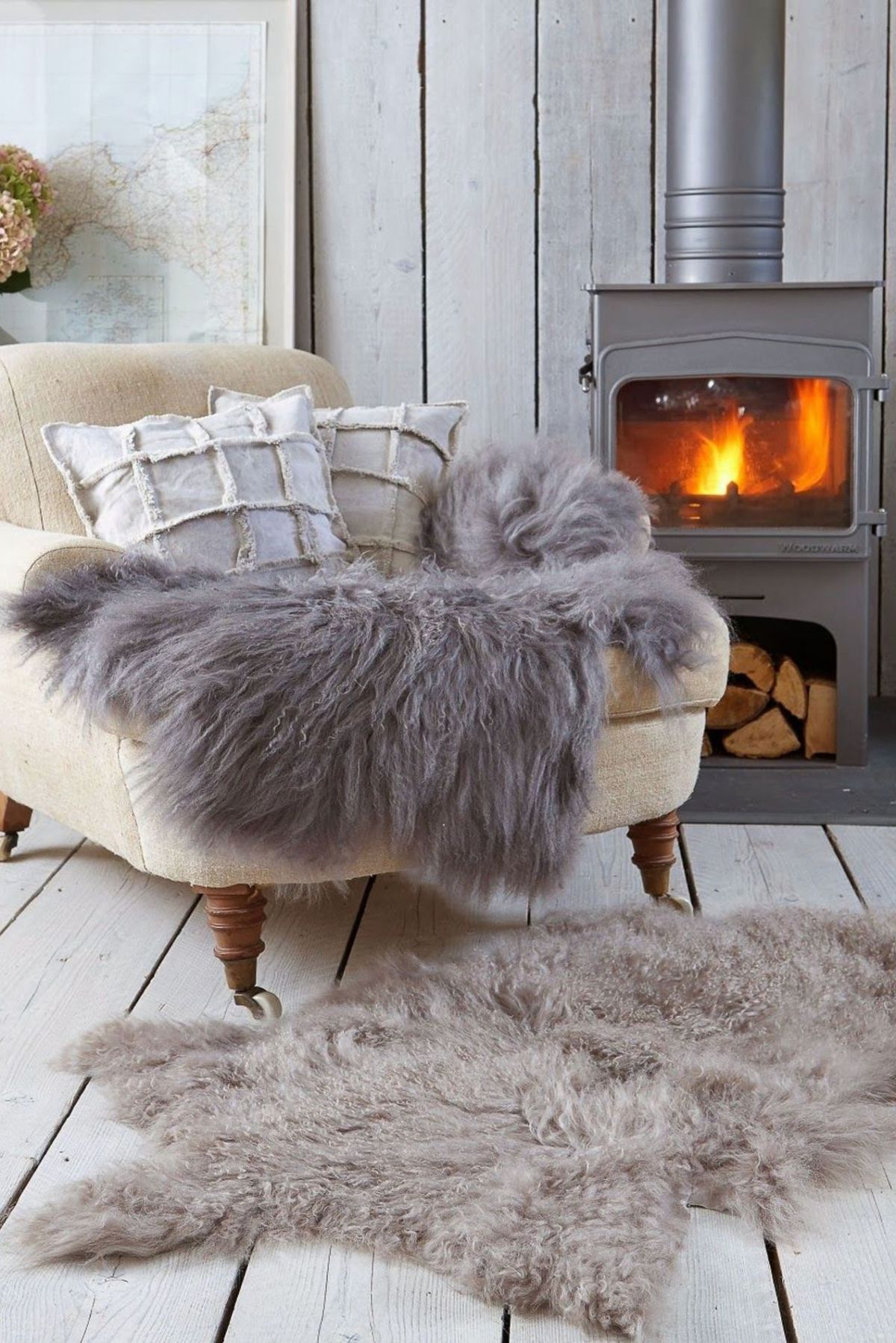 Hearth, Textile, Floor, Natural material, Heat, Grey, Fire screen, Feather, Fur, Beige, 