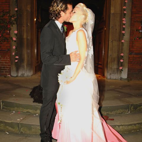 <p>The No Doubt rocker wore <a href="http://www.brides.com/story/gwen-stefani-gavin-rossdale-wedding-photos" target="_blank" data-tracking-id="recirc-text-link">a custom Christian&nbsp;Dior gown&nbsp;designed&nbsp;by John Galliano</a>&nbsp;when she married Gavin Rossdale in 2002. Up top the dress was a classic white, but at the bottom it had been hand-painted hot pink – very Gwen.</p><p><strong data-verified="redactor" data-redactor-tag="strong">RELATED:&nbsp;<a href="http://www.redbookmag.com/love-sex/relationships/g2157/celebrity-weddings/" target="_blank" data-tracking-id="recirc-text-link">12 Completely Over-the-Top Celebrity Weddings</a> </strong><br></p>
