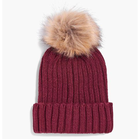 <p>The beanie hat is a cold weather standard. Class it up with Boohoo's grown-up,&nbsp;removable-pom take on the style.&nbsp;($14)</p><p><a href="http://us.boohoo.com/matilda-detachable-faux-fur-pom-beanie-hat/DZZ64018.html?color=135" target="_blank" class="slide-buy--button" data-tracking-id="recirc-text-link">BUY NOW</a></p>