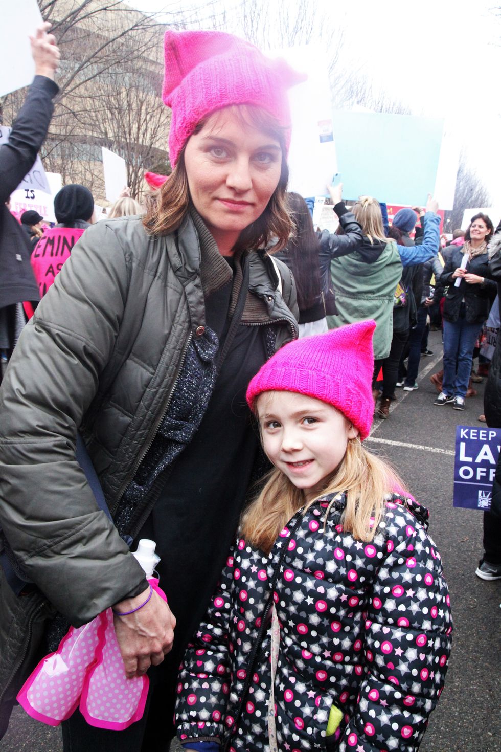 woman and daughter women's march