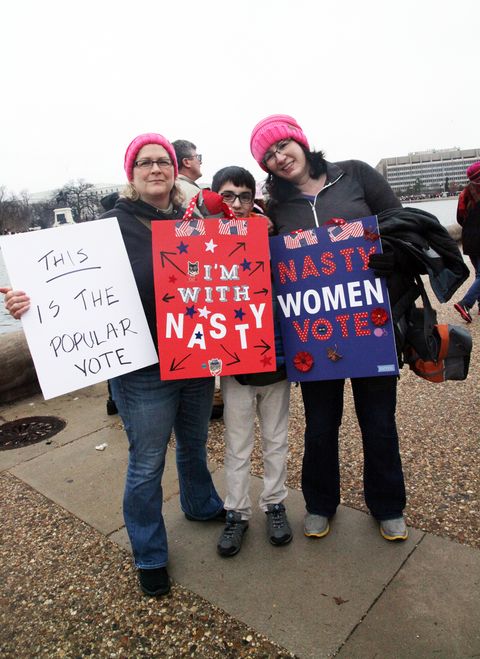 woman with her kids women's march 2017