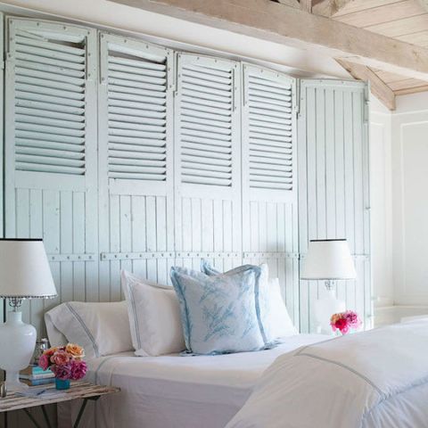 <p>Have a thing for rustic shutters, framed botanical prints, or vintage mirrors? Display your finds on the wall behind your bed to create a 3-D backdrop that's unique to&nbsp;<em data-redactor-tag="em">you</em>.</p>