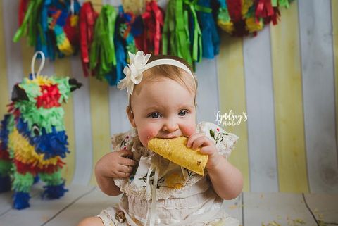 Human, Yellow, Baby & toddler clothing, Food craving, Fruit, Eating, Hair accessory, Plate, Creative arts, Costume accessory, 