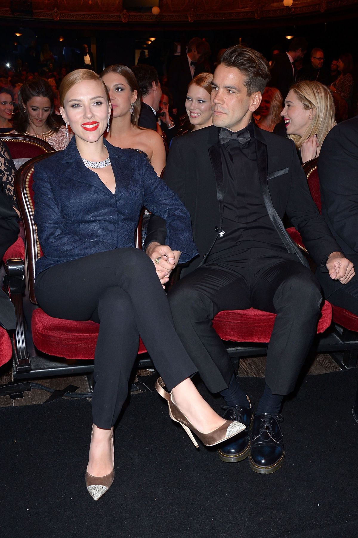 Scarlett Johansson and Romain Dauriac sit in the audience before the start of the 39th Cesar Film Awards 2014 at Theatre du Chatelet on February 28, 2014 in Paris, France. (Photo by Dominique Charriau/Getty Images)