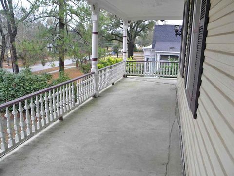 Property, Real estate, Concrete, Shade, Iron, Composite material, Home fencing, Handrail, Porch, Fence, 