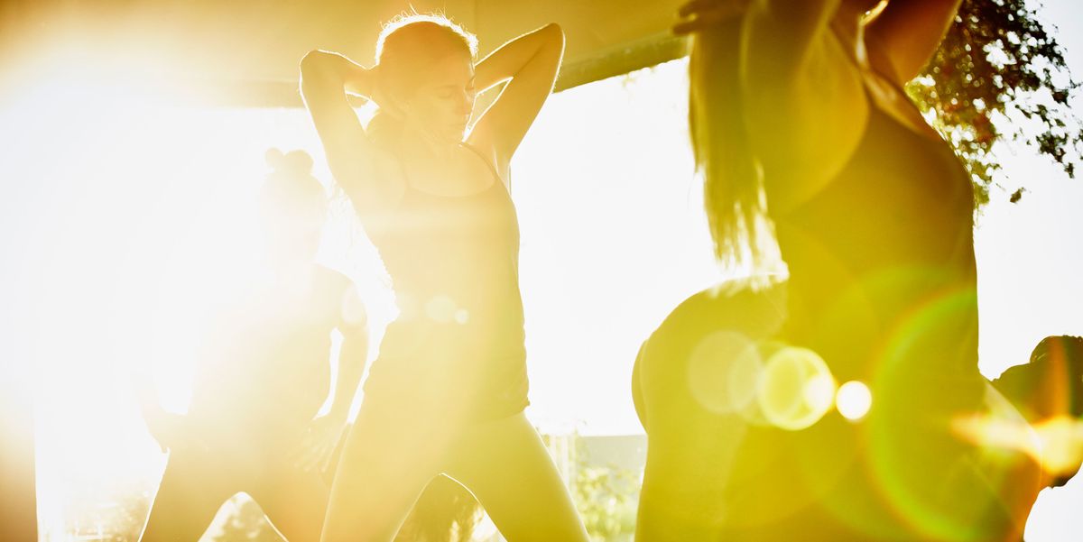 Yellow, Amber, Backlighting, Interaction, Light, People in nature, Lens flare, Pop music, Rock concert, Music venue, 