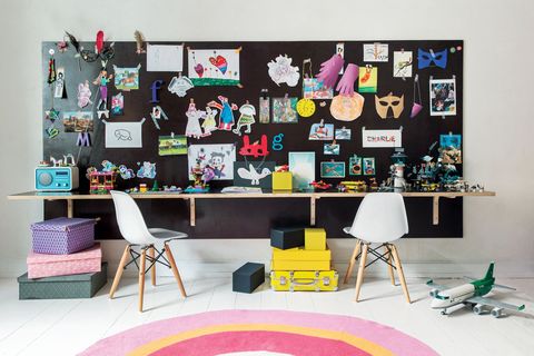 <p>Kids just have so… much… stuff. Instead of fighting against the chaos, work with it. Tack all those souvenirs, <a href="http://www.redbookmag.com/home/decor/features/g2668/diy-easter-crafts/" target="_blank" data-tracking-id="recirc-text-link">craft projects</a>, and random thingamabobs onto a big bulletin board and the mess suddenly becomes something interesting to look at. Then mount a long shelf below it to create a super long <a href="http://www.redbookmag.com/home/decor/g773/desk-makeovers/" target="_blank" data-tracking-id="recirc-text-link">desk</a> — and think of it as a genius bar for your children's imaginations.</p><p><strong data-redactor-tag="strong" data-verified="redactor">RELATED:&nbsp;</strong><span><a href="http://www.redbookmag.com/home/decor/tips/g2358/decor-hacks/"></a><strong data-redactor-tag="strong" data-verified="redactor"><a href="http://www.redbookmag.com/home/decor/tips/g2358/decor-hacks/" target="_blank" data-tracking-id="recirc-text-link">17 Affordable Decorating Hacks From Top Designers</a></strong></span></p>