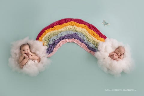 rainbow babies photoshoot couple has rainbow themed newborn shoot