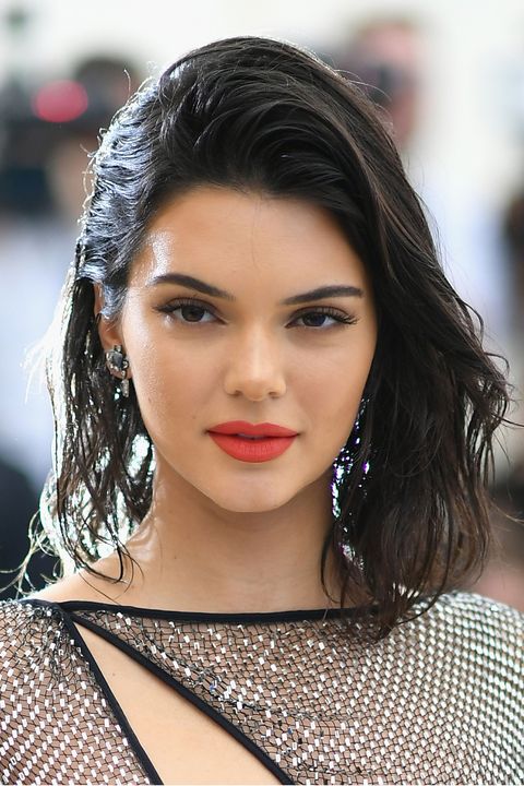 <p><a href="http://www.redbookmag.com/body/health-fitness/a49542/kendall-jenner-abs-workout/" target="_blank" data-tracking-id="recirc-text-link">Kendall Jenner's</a> hair also&nbsp;sits on the fence between black and brown, but her&nbsp;color is as transitional as it is hard to define.&nbsp;</p>