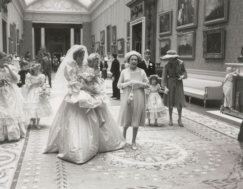 <p>Princess Diana walks with Hambro and Queen Elizabeth.</p>