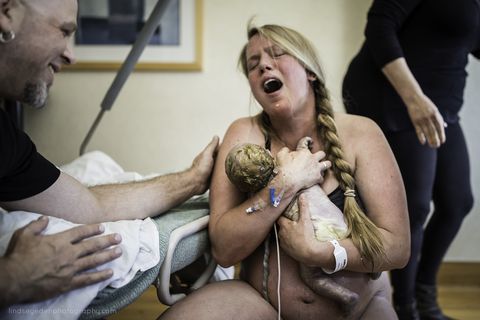 <p>A new mother holds her child to her chest and cries with joy.<br><br><a href="http://lindseyedenphotography.com/" target="_blank" data-tracking-id="recirc-text-link">Lisa Eden, Eden Photography</a></p>