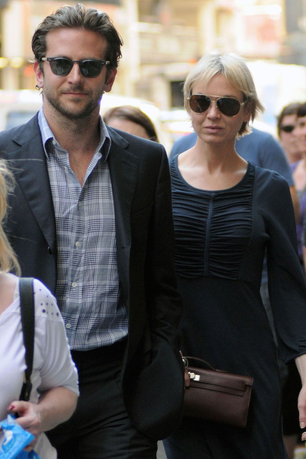 <p>The former couple <a href="http://www.usmagazine.com/celebrity-news/news/the-many-loves-of-bradley-cooper-201341" data-tracking-id="recirc-text-link">met on the set</a> of the 2006 thriller&nbsp;<em data-verified="redactor" data-redactor-tag="em">Case 39</em><span class="redactor-invisible-space" data-verified="redactor" data-redactor-tag="span" data-redactor-class="redactor-invisible-space">. They called it quits in March 2011.&nbsp;</span></p>