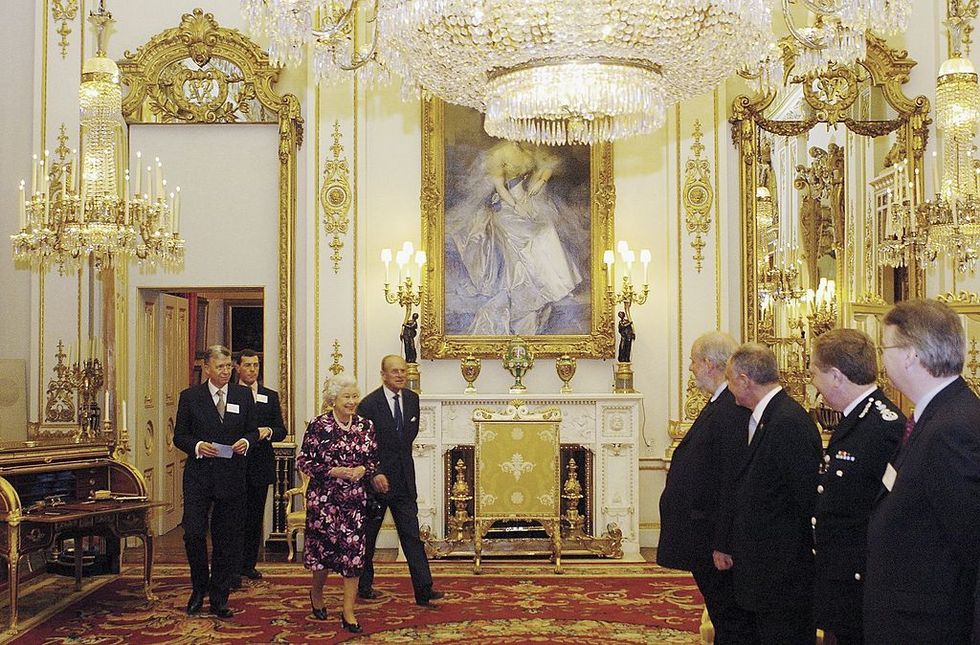 <p>As soon as the Queen enters the room, everyone <a href="http://www.eonline.com/shows/the_royals/news/610777/8-things-you-should-never-do-when-meeting-the-royals" target="_blank" data-tracking-id="recirc-text-link">must stand to greet her</a> and should not sit down until she does. Only then is it polite to take a rest.&nbsp;<span class="redactor-invisible-space" data-verified="redactor" data-redactor-tag="span" data-redactor-class="redactor-invisible-space"></span></p>