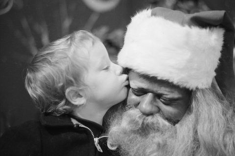 <p>During the Christmas retail season, a young, white boy kisses a black Santa Claus on the cheek in an unidentified department store, 1970.<span class="redactor-invisible-space" data-verified="redactor" data-redactor-tag="span" data-redactor-class="redactor-invisible-space"></span></p>