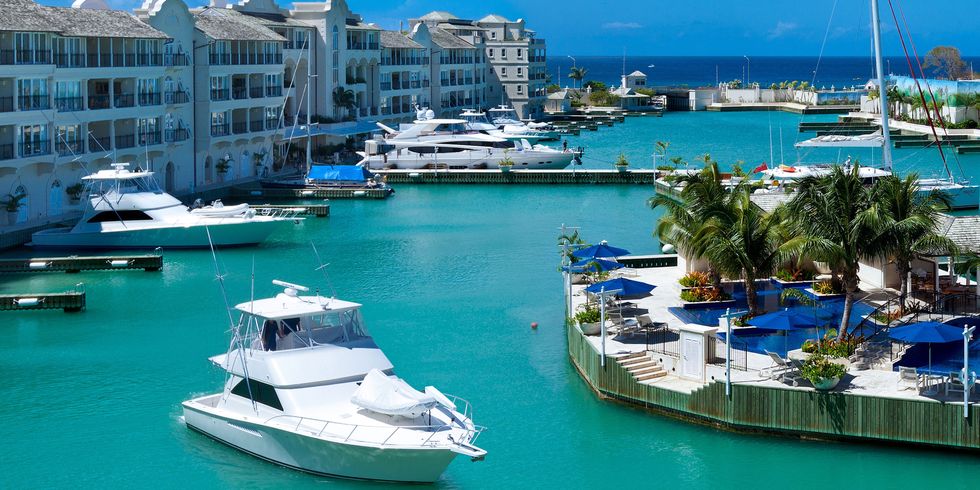 Water transportation, Marina, Harbor, Boat, Luxury yacht, Yacht, Port, Vehicle, Vacation, Tourism, 