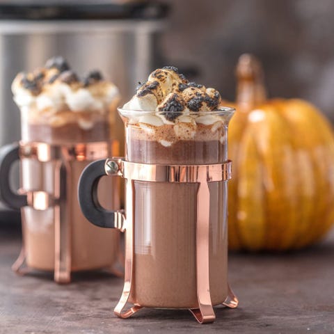 spiked pumpkin hot chocolate <p>When we heard that during the fall the Omni Berkshire Place hotel in New York City (they put our Real Women Style Awards winners up when they were in town) gives guests hot cocoa and cashmere blankets each night to enjoy on their terraces we thought <em data-redactor-tag="em" data-verified="redactor">The only thing that could make that better would be if you got to enjoy that with your crew.</em> Gather up your coziest throws and hit some comfy chairs in the backyard—this boozy pumpkin pie hot cocoa will be sure to keep the laughs going all night. </p><p>Get the recipe at <a href="https://www.thecookierookie.com/spiked-slow-cooker-pumpkin-pie-hot-chocolate/" data-tracking-id="recirc-text-link">The Cookie Rookie</a>.</p>