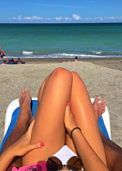 Sun tanning, Human leg, Bikini, Beach, Leg, Undergarment, Vacation, Summer, Thigh, Foot, 