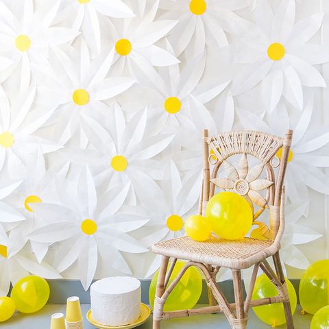 <p>Go all out with a cheery white-and-yellow color scheme. This daisy backdrop is made out of butcher paper.&nbsp;</p><p><strong data-redactor-tag="strong" data-verified="redactor">Get the tutorial at&nbsp;<a href="http://thehousethatlarsbuilt.com/2016/06/diy-paper-daisy-backrop.html/" target="_blank" data-tracking-id="recirc-text-link">The House That Lars Built</a>.&nbsp;</strong><span class="redactor-invisible-space" data-verified="redactor" data-redactor-tag="span" data-redactor-class="redactor-invisible-space"><strong data-redactor-tag="strong" data-verified="redactor"><a href="http://thehousethatlarsbuilt.com/2016/06/diy-paper-daisy-backrop.html/"></a></strong><a href="http://thehousethatlarsbuilt.com/2016/06/diy-paper-daisy-backrop.html/"></a></span></p><p><span class="redactor-invisible-space" data-verified="redactor" data-redactor-tag="span" data-redactor-class="redactor-invisible-space"><strong data-redactor-tag="strong" data-verified="redactor">RELATED:&nbsp;</strong></span><a href="http://www.redbookmag.com/life/mom-kids/a51327/prince-george-funny-pictures-sassy-moments/" target="_blank" data-tracking-id="recirc-text-link"><strong data-redactor-tag="strong" data-verified="redactor">33 of Prince George's Sassiest Moments to Celebrate His Fourth Birthday</strong></a></p>