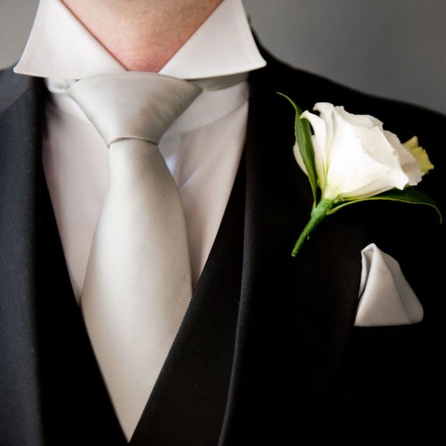 Suit, White, Formal wear, Tuxedo, Flower, Dress, Plant, Photography, Neck, Tie, 