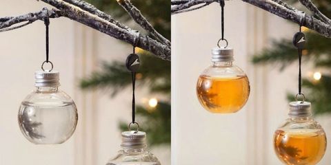 Mason jar, Glass bottle, Yellow, Glass, Branch, Tree, Bottle, Oil lamp, Christmas decoration, Twig, 