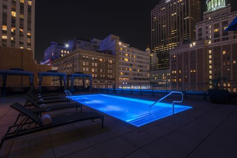 Night, Light, Lighting, Architecture, Swimming pool, Sky, Condominium, Building, Metropolitan area, City, 