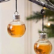 Mason jar, Glass bottle, Yellow, Glass, Branch, Tree, Bottle, Oil lamp, Christmas decoration, Twig, 