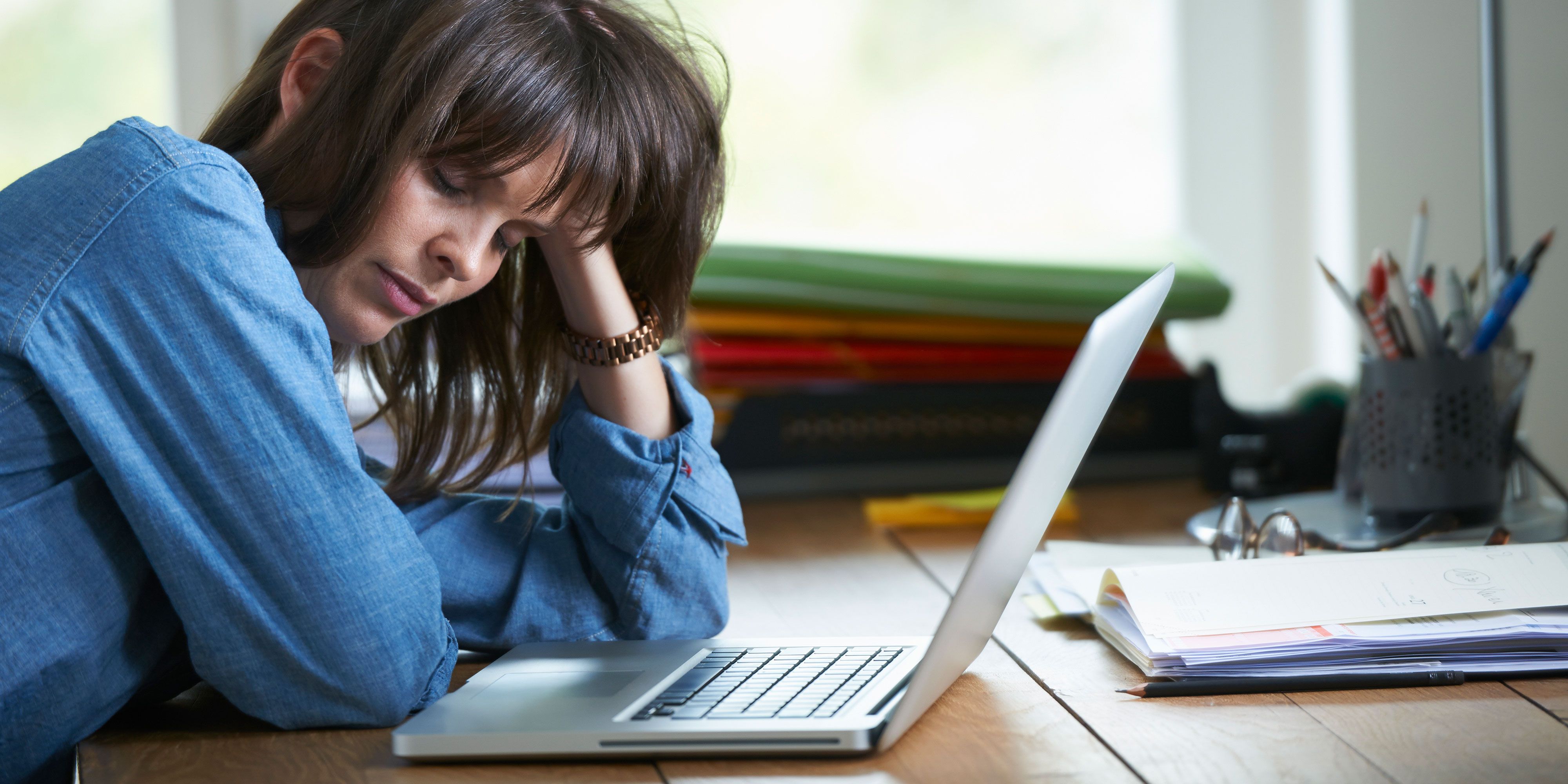 Image result for pictures of people looking tired while working in an office