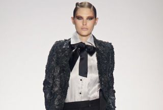 model on bill blass runway wearing lace and bows on shirt