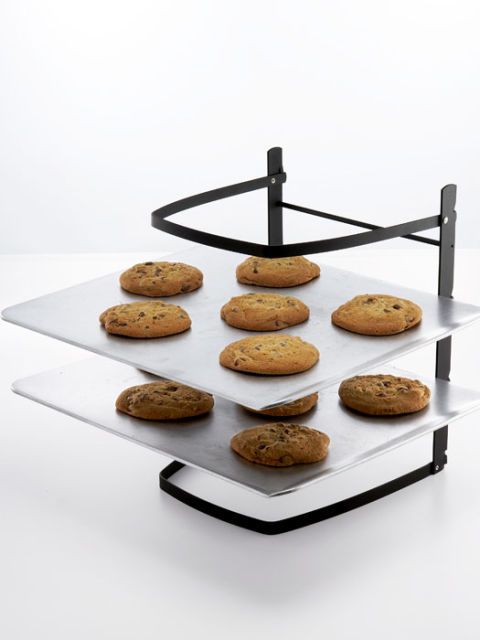 baker's rack holding chocolate chip cookies