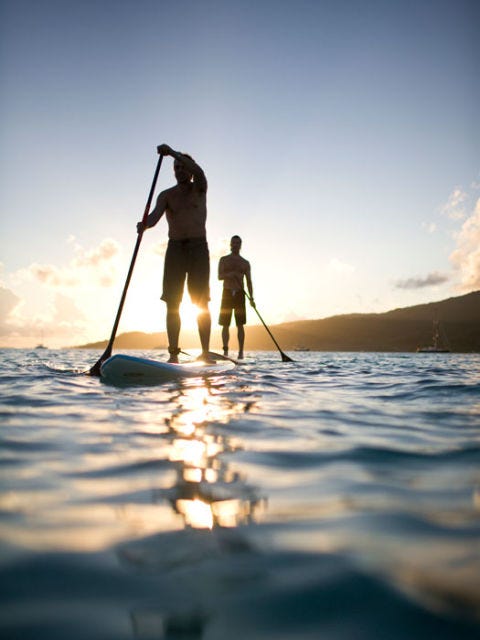 If he's athletic…Try a sunset paddle image