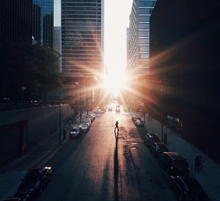 Sky, Cloud, Morning, Light, Sunset, Urban area, Daytime, Atmospheric phenomenon, Sunlight, City, 