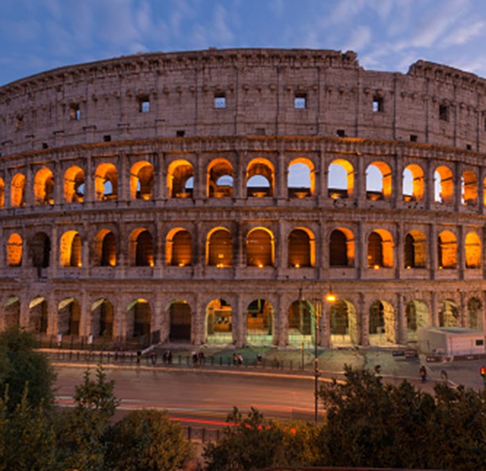 Landmark, Architecture, Amphitheatre, Ancient roman architecture, Building, Ancient rome, Historic site, Sky, Ancient history, Arch, 