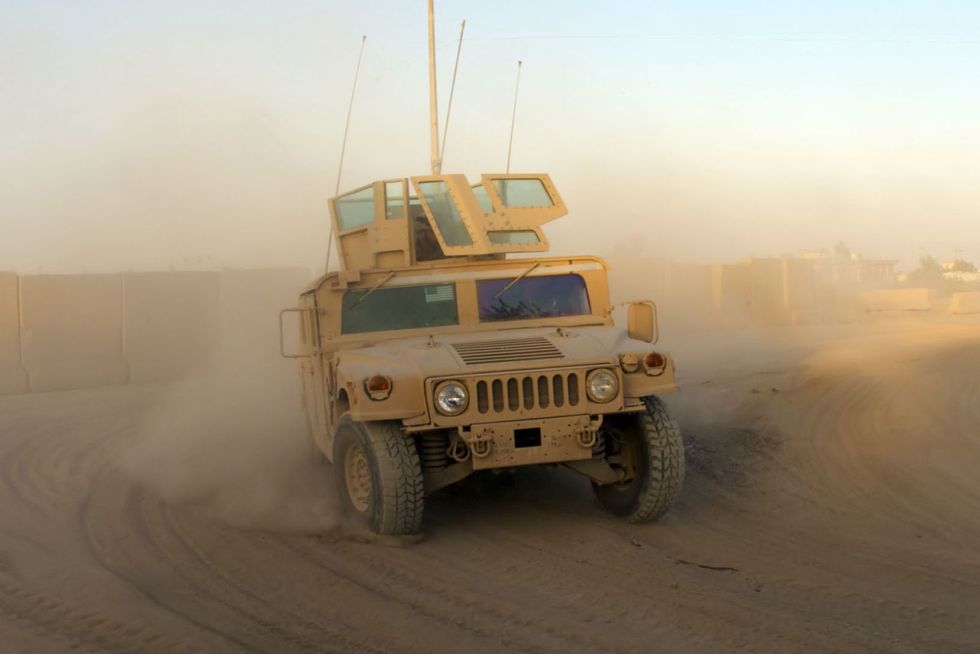 Buyers shell out up to $41,000 for Humvees at auction