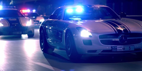 Dubai police show off their supercars at night
