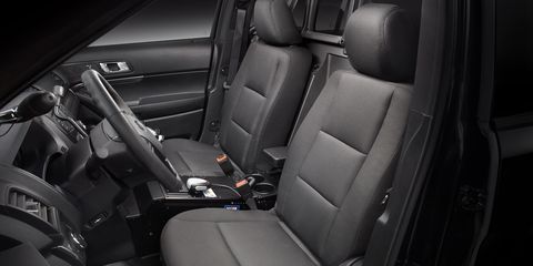 The front seats of the 2016 Ford Police Interceptor Utility have been designed with the lower bolster removed to better accommodate officers' utility belts. ,The front seats of the 2016 Ford Police Interceptor Utility have been designed with the lower bolster removed to better accommodate officers' utility belts. 