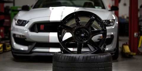 <p>These are some of the more plain wheels on this listing, just at that place's a skilful reason for that: they're <a href="http://www.roadandtrack.com/new-cars/car-technology/news/a26046/fords-carbon-fiber-gt350r-wheels-use-nasa-technology/" target="_blank">made of carbon fiber</a>. Ford went all out for the GT350R and crush anybody to mass-producing carbon cobweb wheels, which are lighter and stronger than aluminum.</p>
