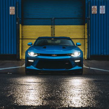 <p>Here's the Camaro. Hyper Blue (great color), low-gloss black wheels (meh), 455 horsepower (yes), and, of course, a 6-speed stick.  </p>