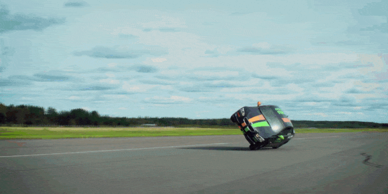 Watch a Stunt Driver Set a 115-MPH World Record for Driving on Two Wheels