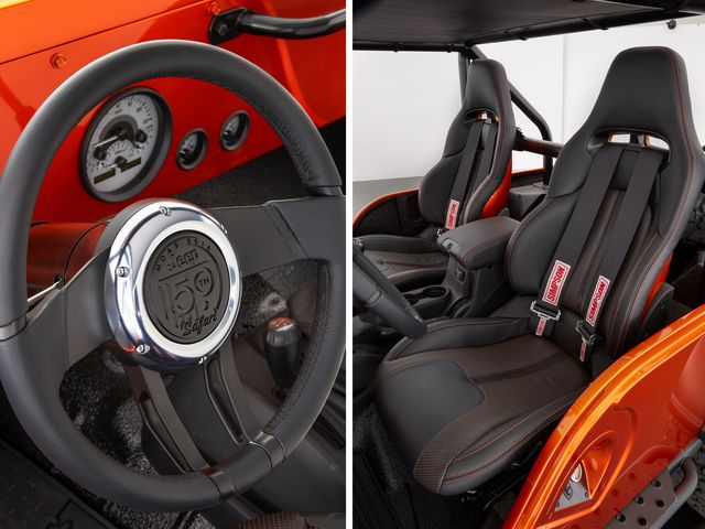 Motor vehicle, Mode of transport, Steering part, Steering wheel, Speedometer, Gauge, Orange, Car seat, Measuring instrument, Fuel gauge, 