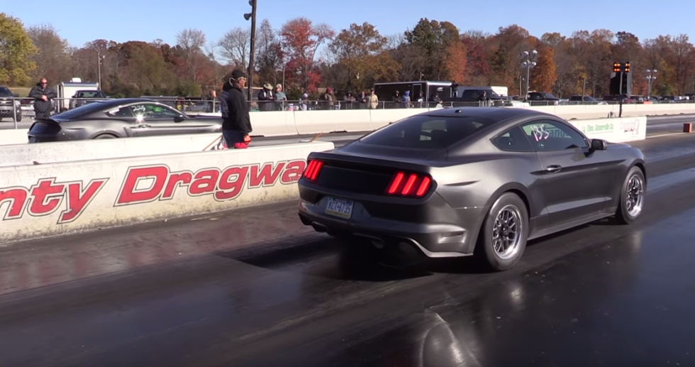 Watch this Tuned EcoBoost Mustang Beat a GT in a Drag Race and then Explode