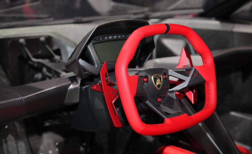 Salon Sports Car. Steering Wheel, Dashboard. Leather, Red