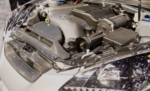 Automotive design, Engine, Automotive lighting, Automotive engine part, Headlamp, Auto part, Machine, Automotive super charger part, Automotive fuel system, Engineering, 