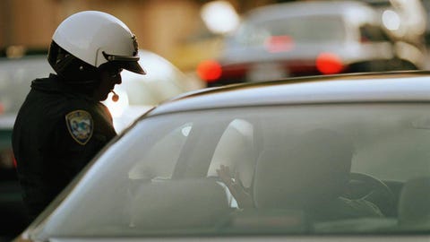 Motor vehicle, Helmet, Glass, Personal protective equipment, Windshield, Law enforcement, Automotive window part, Vehicle door, Emergency service, Police officer, Motor vehicle, Helmet, Glass, Personal protective equipment, Windshield, Law enforcement, Automotive window part, Vehicle door, Emergency service, Police officer,