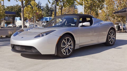 Used Tesla Roadster And A Handheld Hydrogen Charger This A Pre Owned Tesla Roadster And Handheld Hydrogen Charging Station